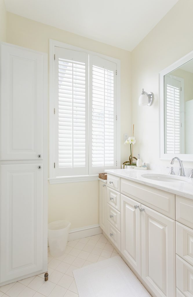 white bathroom with large window